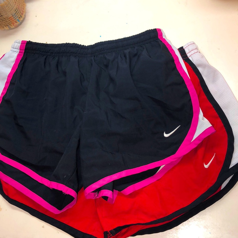 Two pairs of size large juniors Nike shorts!